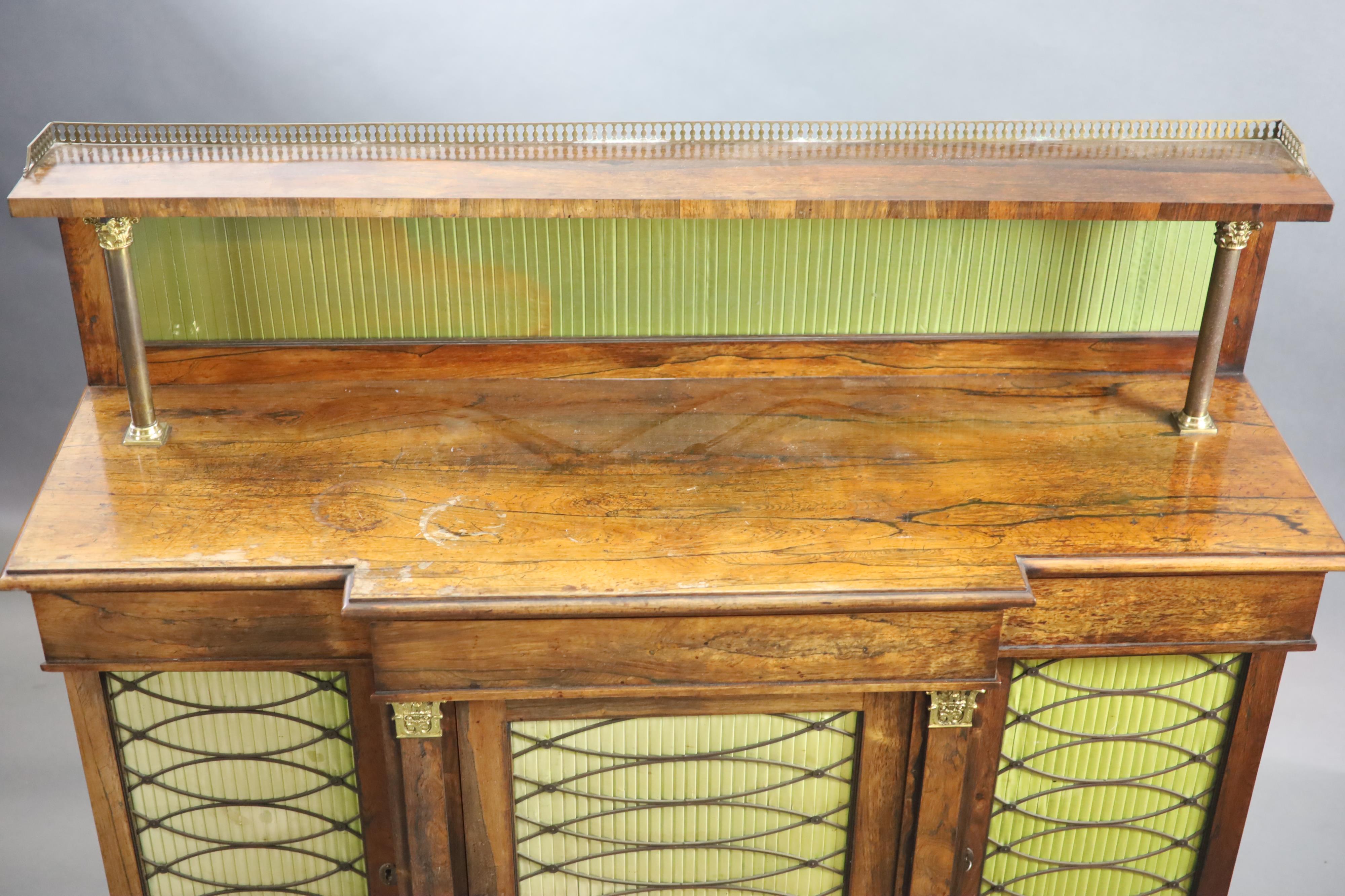 A Regency rosewood breakfront chiffonier, the raised back with three quarter gallery, W.136cm D.45cm H.123cm